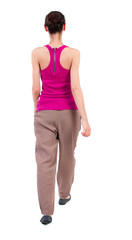 back view of walking  curly woman.  backside view of person.  Rear view people collection. Isolated over white background. dark-skinned girl in a red shirt goes the distance.