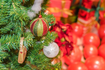 Decorated Christmas tree on blurred, sparkling