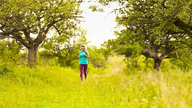 girl with headphones running