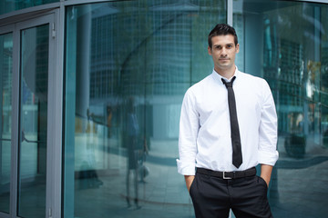 portrait of a businessman outside office building
