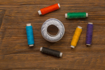 Fototapeta na wymiar Colorful bobbins of threads