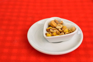Heart Shaped Bowl With Dried Hard Fruits And Peanuts