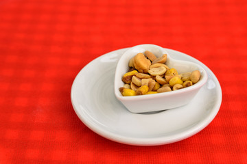 Heart Shaped Bowl With Dried Hard Fruits And Peanuts