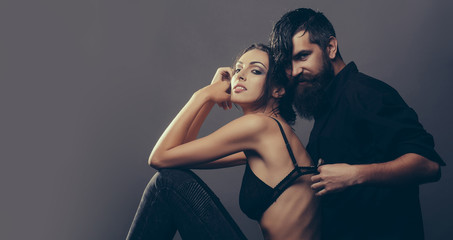 sexy couple of woman and bearded man