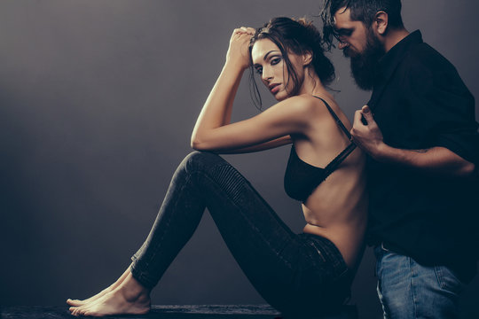 sexy couple of woman and bearded man