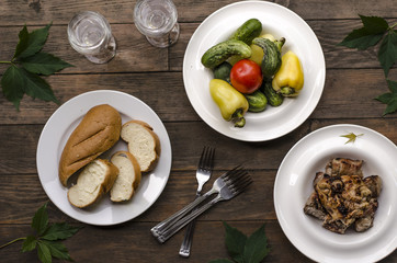 Picnic barbecue with vegetables and bread   
