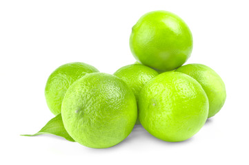 Group of ripe limes on white background