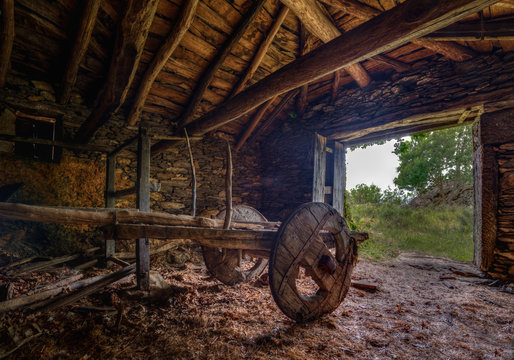 antique carriage in an old barn