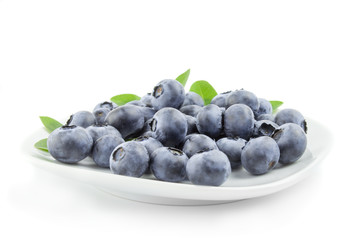 Fresh Blueberries In A White plate
