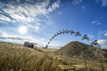 Man flying with his mx motorbike - freestyle motocross