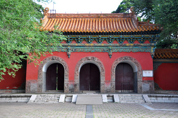 Fototapeta premium Main Red Gate of Fuling Tomb of Qing Dynasty, Shenyang, China. Fuling Tomb is a UNESCO World Heritage Site since 2004. Fuling Tomb (East Tomb) is the mausoleum of Nurhaci.