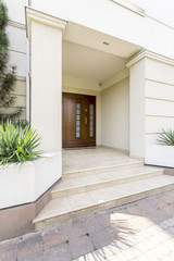 Massive colums to support luxurious house entrance