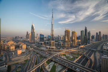 Fototapeta na wymiar Dubai skyline with beautiful city close to it's busiest highway on traffic