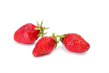 Ripe red strawberries on a white background