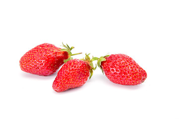 Ripe red strawberries on a white background