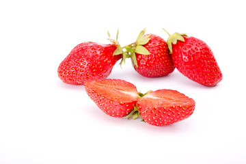 Ripe red strawberries on a white background