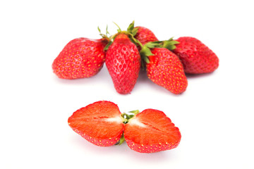 Ripe red strawberries on a white background