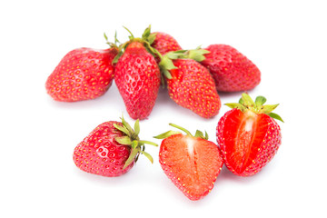 Ripe red strawberries on a white background
