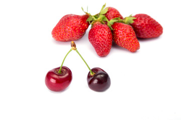 Red Strawberry and red cherry on white background