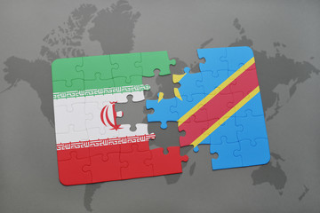 puzzle with the national flag of iran and democratic republic of the congo on a world map background.
