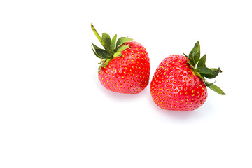 Fresh strawberries were placed on a white background