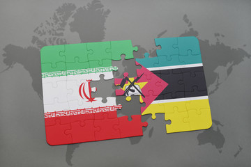 puzzle with the national flag of iran and mozambique on a world map background.
