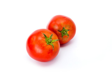  tomatoes and hot peppers white background