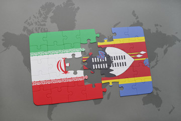 puzzle with the national flag of iran and swaziland on a world map background.