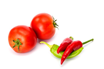  tomatoes and hot peppers white background