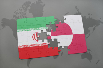 puzzle with the national flag of iran and greenland on a world map background.