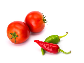  tomatoes and hot peppers white background