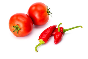  tomatoes and hot peppers white background