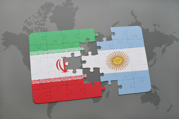 puzzle with the national flag of iran and argentina on a world map background.