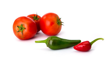 tomatoes and hot peppers white background