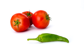 tomatoes and hot peppers white background