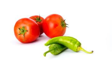 tomatoes and hot peppers white background