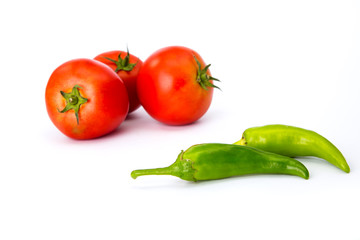 tomatoes and hot peppers white background
