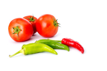 tomatoes and hot peppers white background