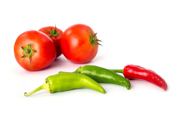 tomatoes and hot peppers white background