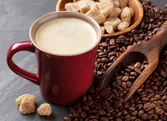 Coffee cup, beans and brown sugar