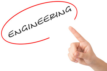 Hand of a young girl points to a word