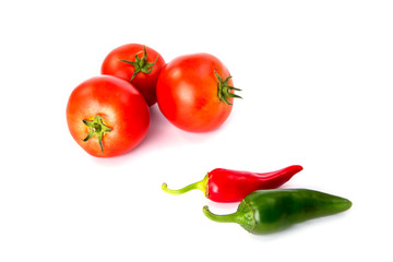 tomatoes and hot peppers white background
