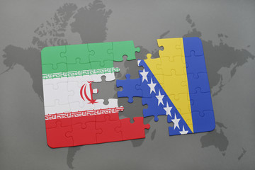 puzzle with the national flag of iran and bosnia and herzegovina on a world map background.