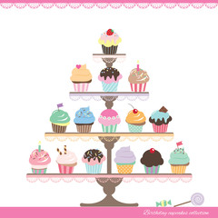 Cupcakes on stand isolated on white.