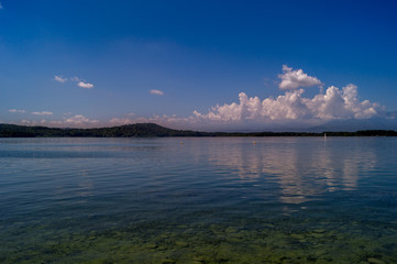 Lake of Viverone panorama with mountains on horizon.