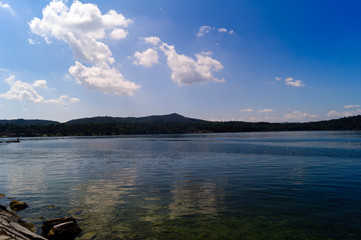 Lake of Viverone panorama with mountains on horizon.
