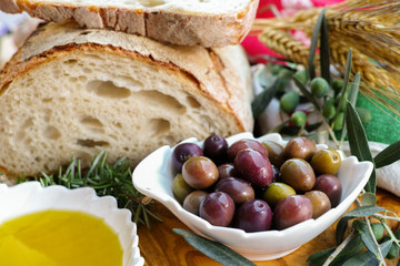 Traditional italian appetizer - fresh homemade bread, extra virgin olive oil