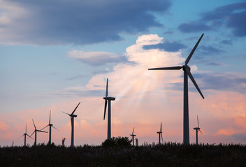 wind turbines al sunset