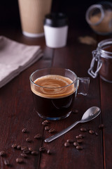 Black coffee on a dark wooden table