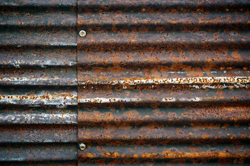 Old and rusty damaged galvanized texture.Grunge texture of old rusty metal with scratches and cracks background,color toned.